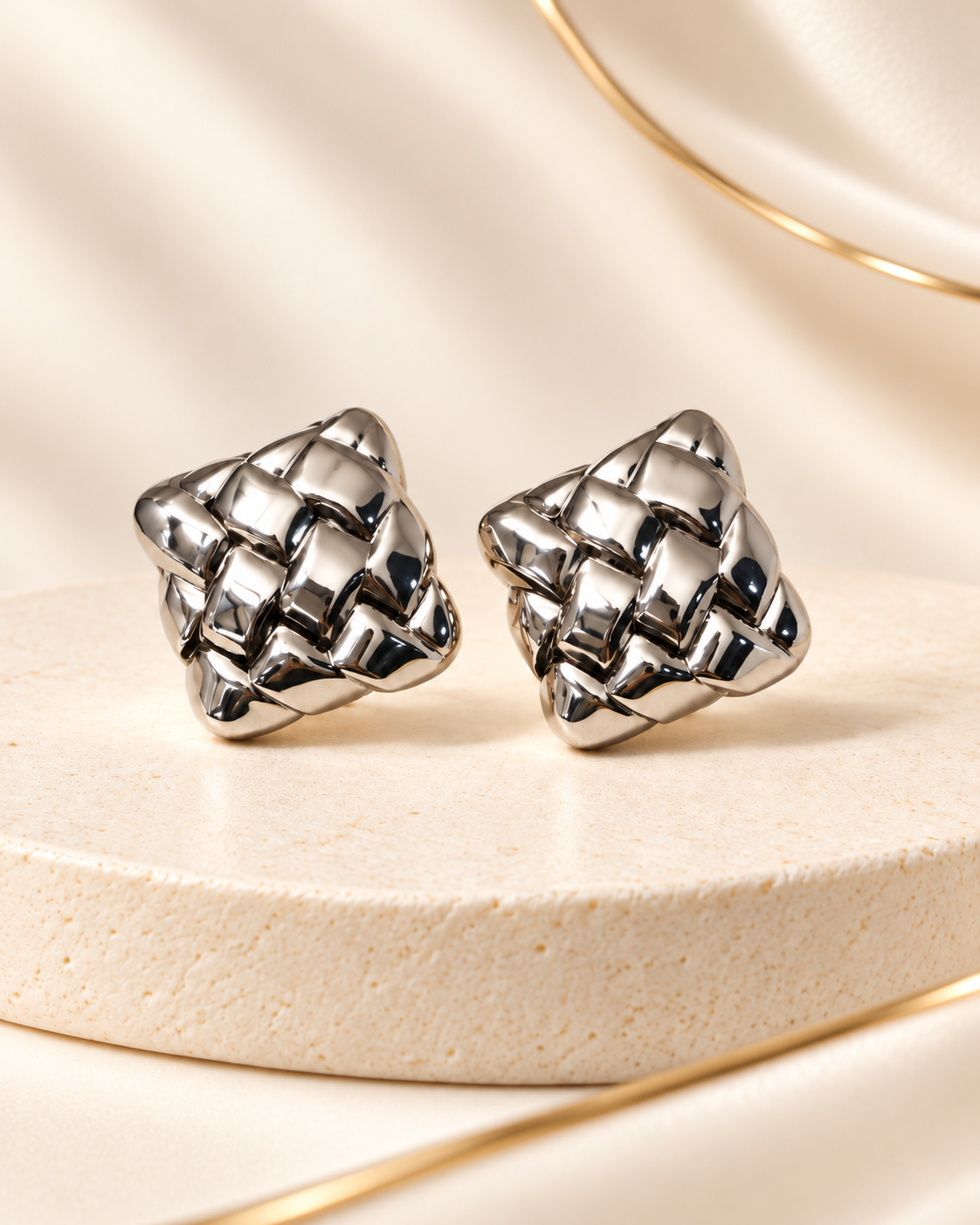 Silver sculptural woven square stud earrings from JIAD, alternate view
