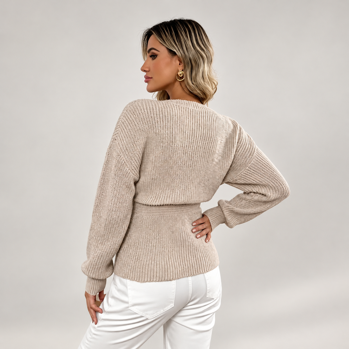 Beige fitted-waist knit cardigan, back view